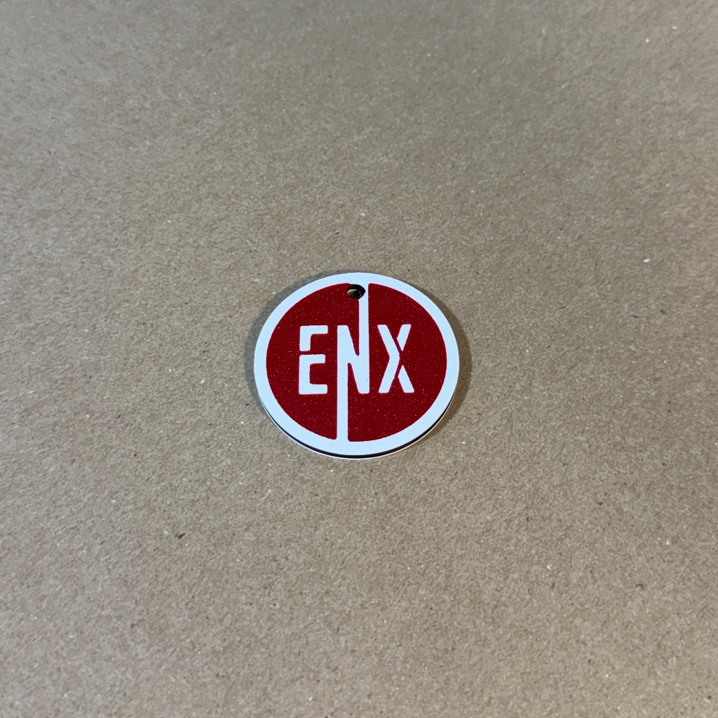 ENX Keychain with red and white Elevate Next branding